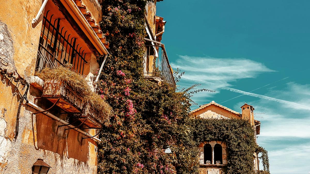 brown concrete building under blue sky during daytime
