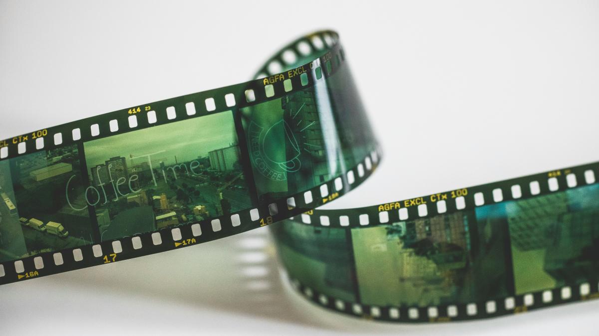 green and black framed eyeglasses