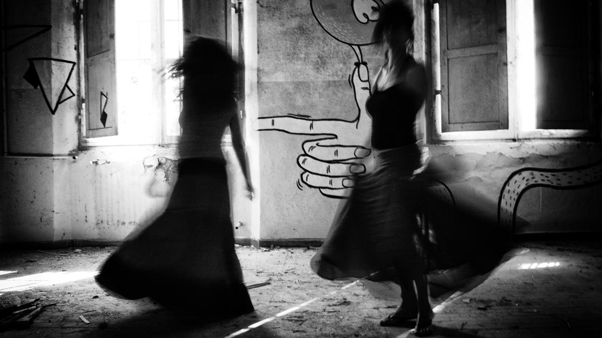 a couple of women standing next to each other