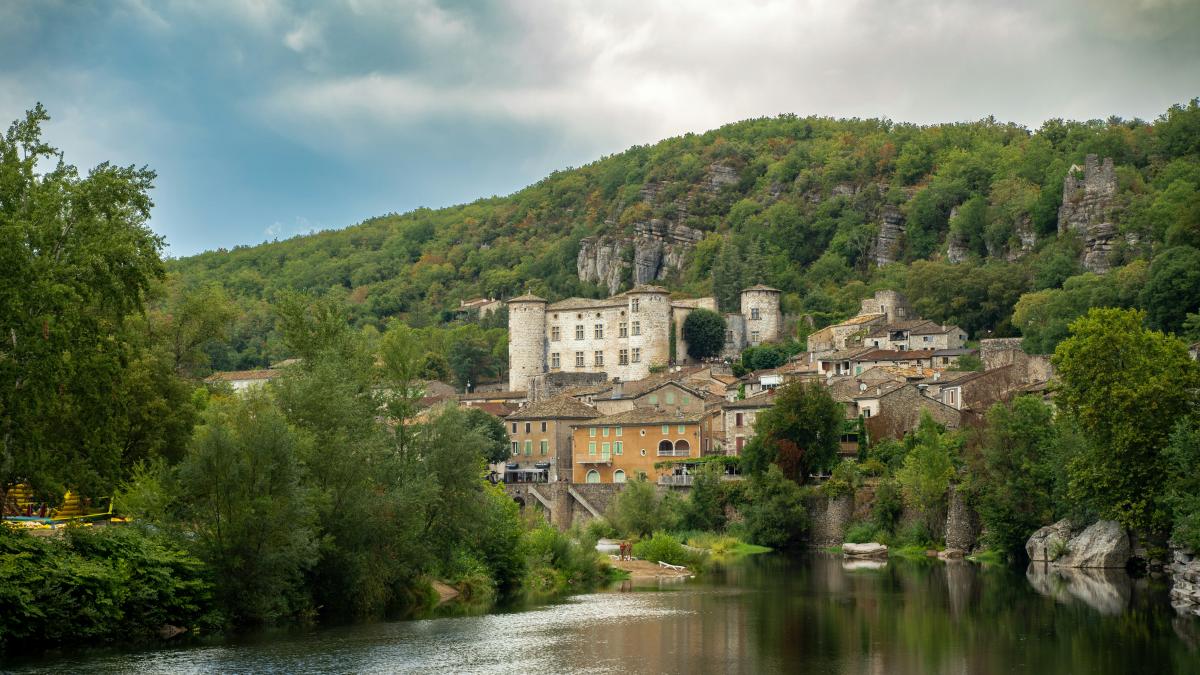 a river with a town on the side of it