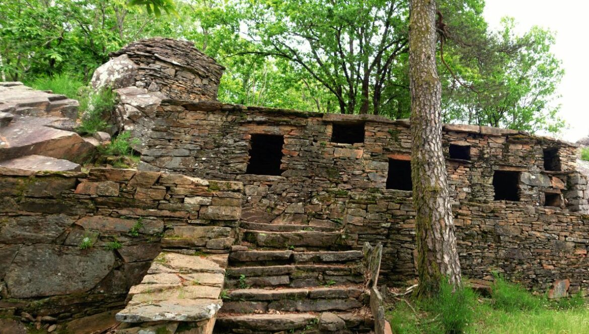a stone building with windows