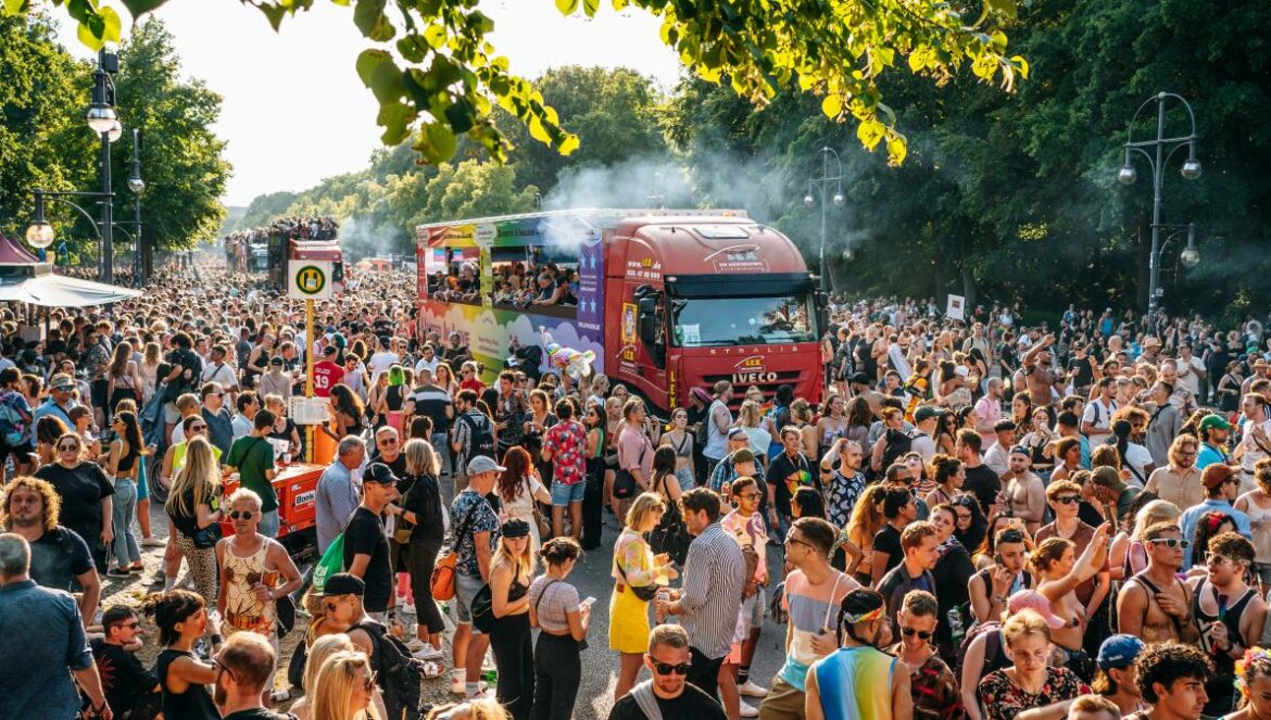 a large crowd of people watching a parade