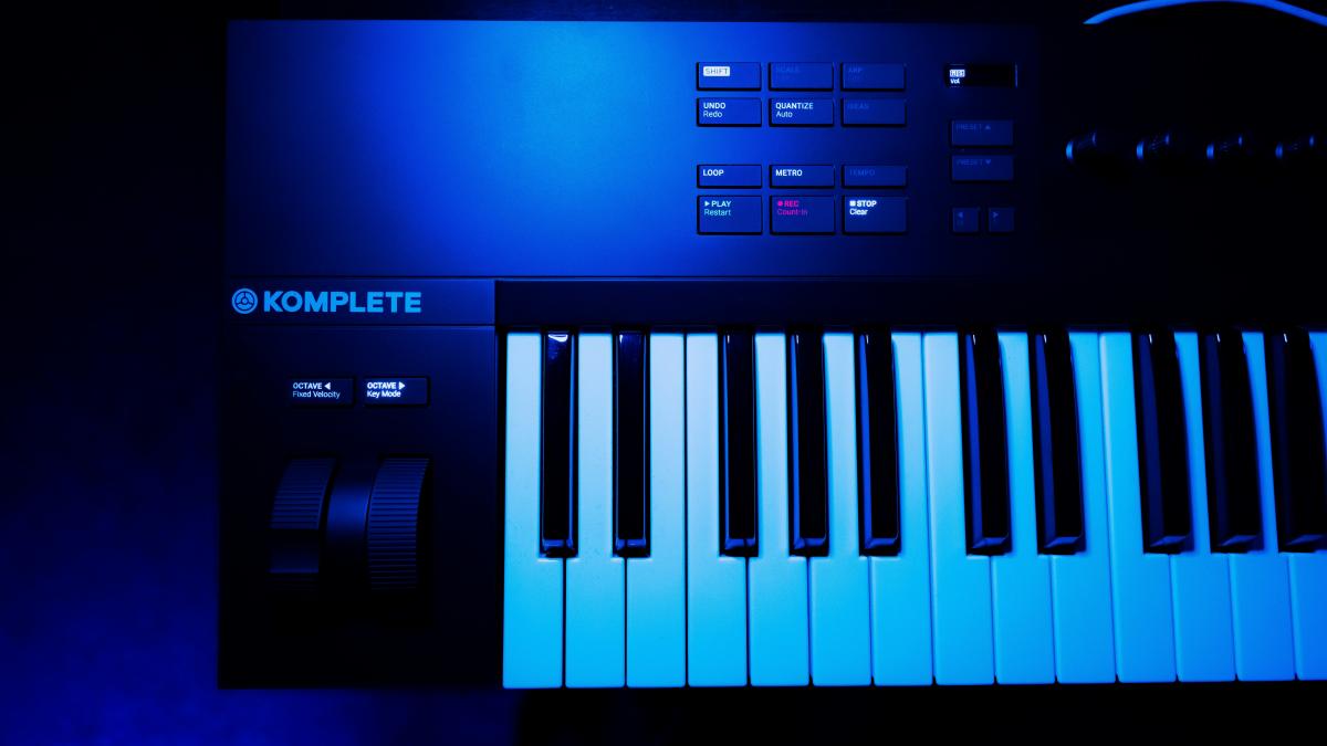 a close up of a keyboard in a dark room