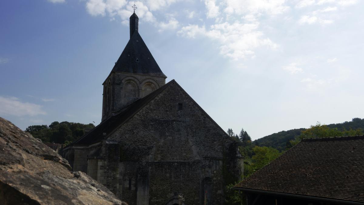 an old building with a steeple and a steeple on top