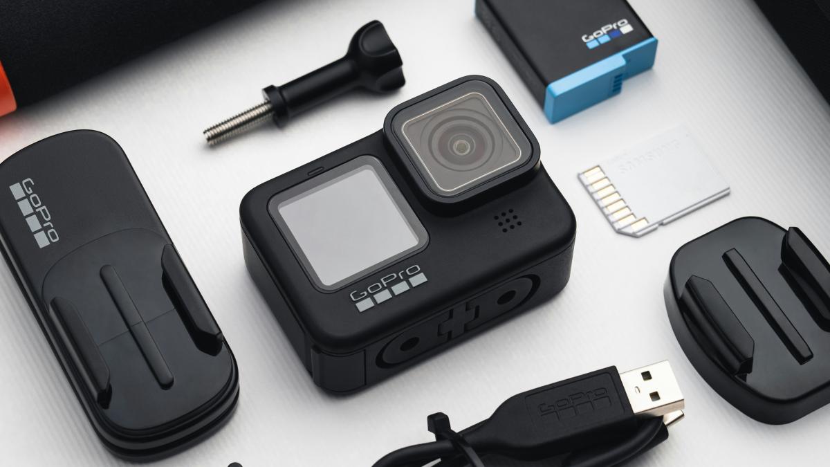 a couple of cameras sitting on top of a table