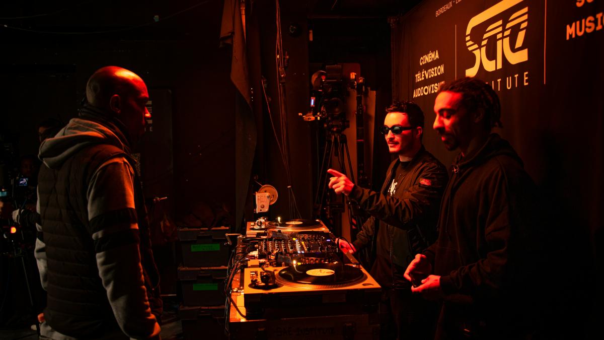 a group of men standing next to each other