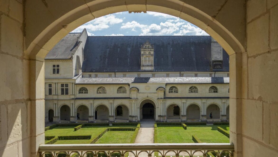 a view of a building through an archway