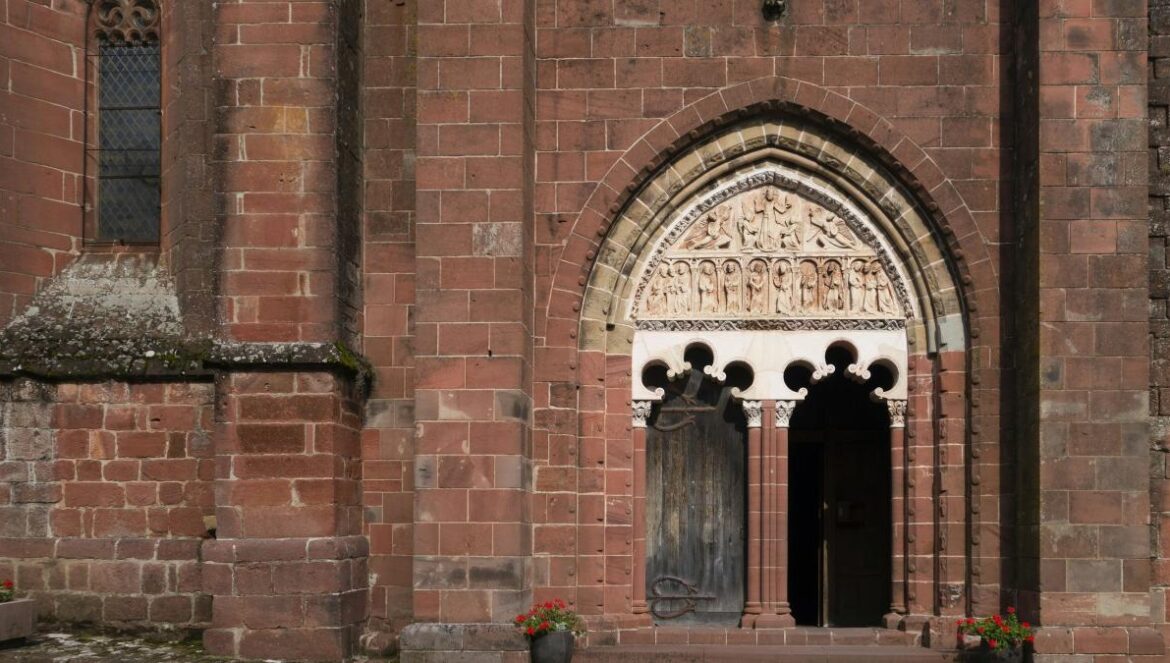 a tall brick building with a large doorway