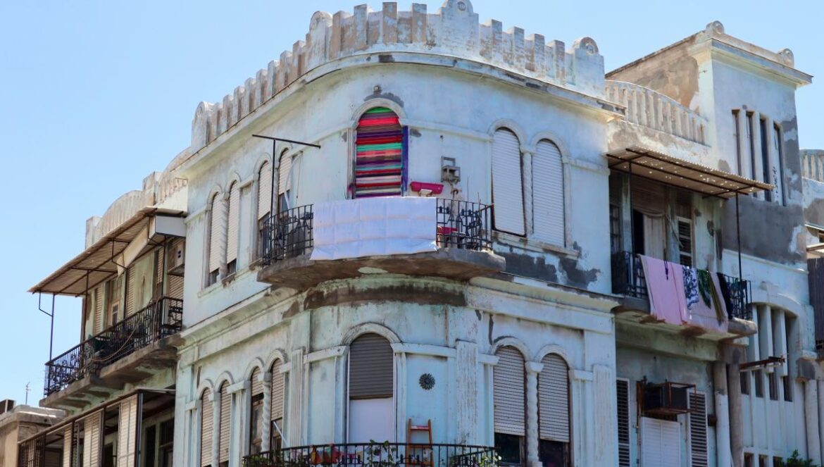 an old building with a balcony and balconies