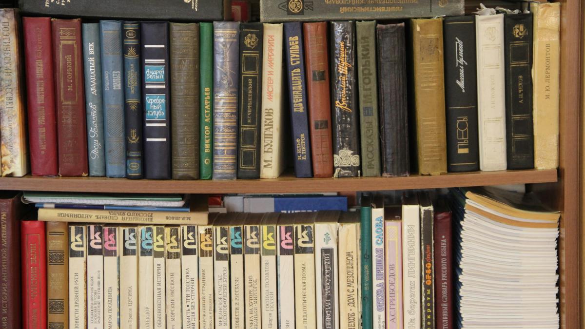 a book shelf filled with lots of books