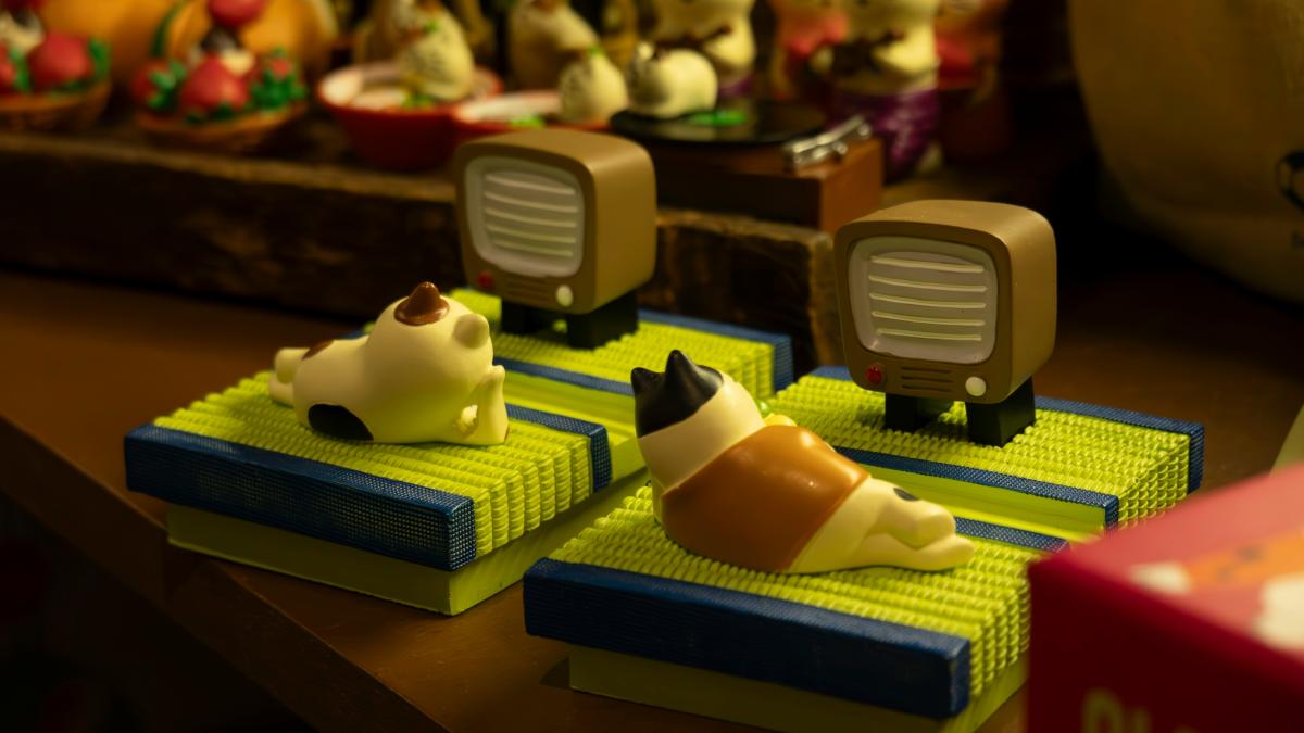 a close up of three toy animals on a table