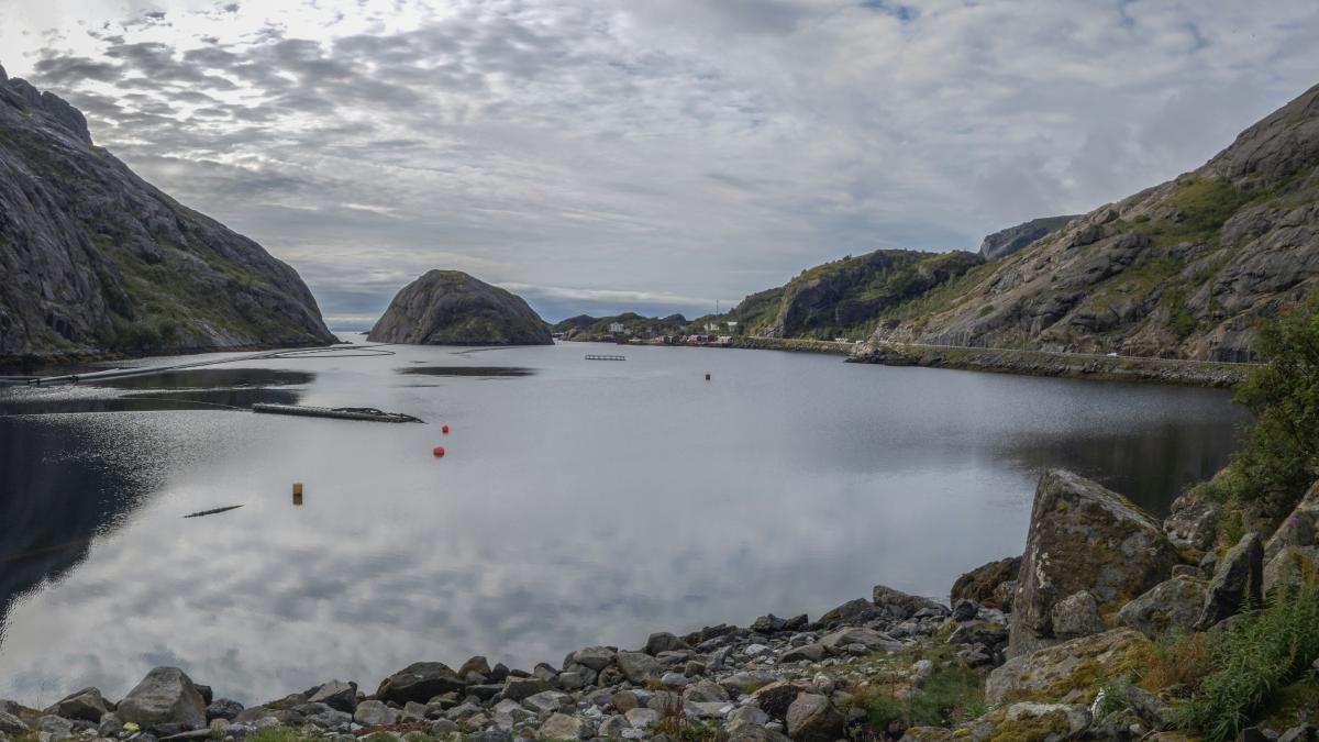 a large body of water surrounded by mountains