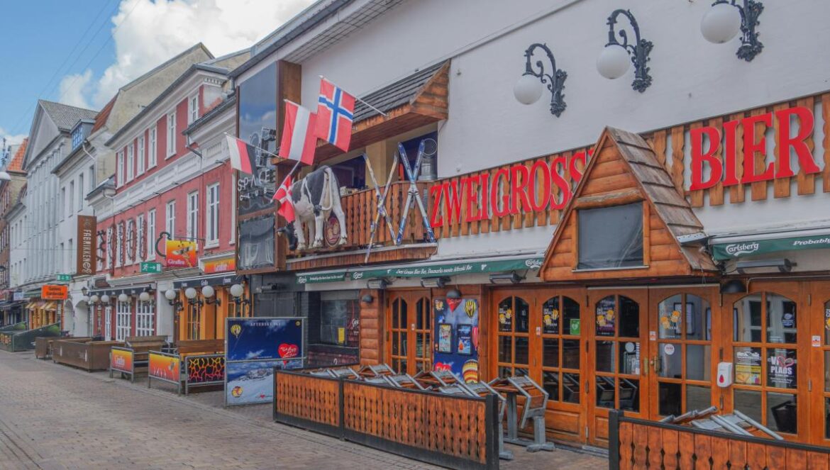 a row of shops on a city street