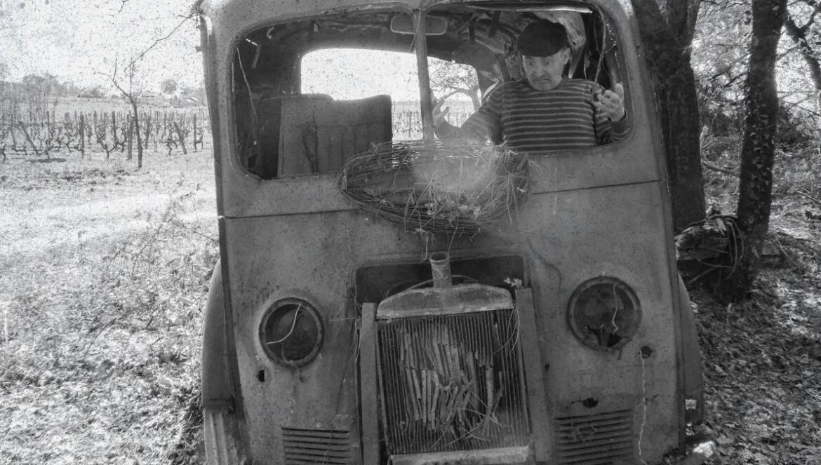 a black and white photo of an old truck