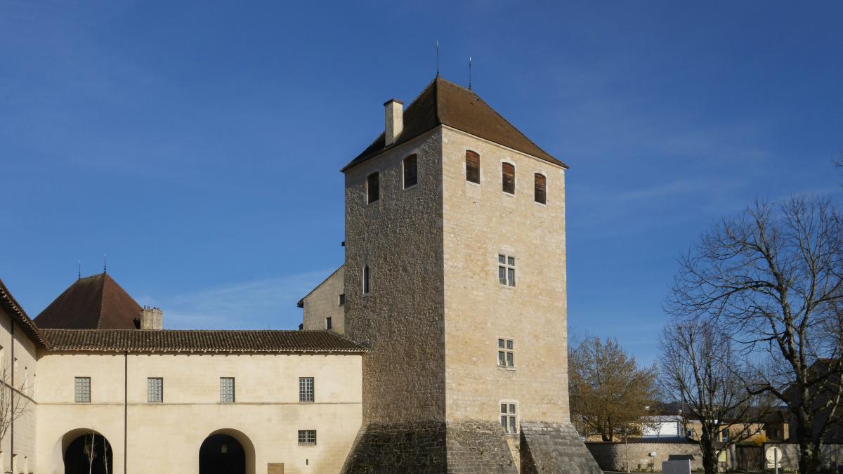 a large building with a clock on the top of it