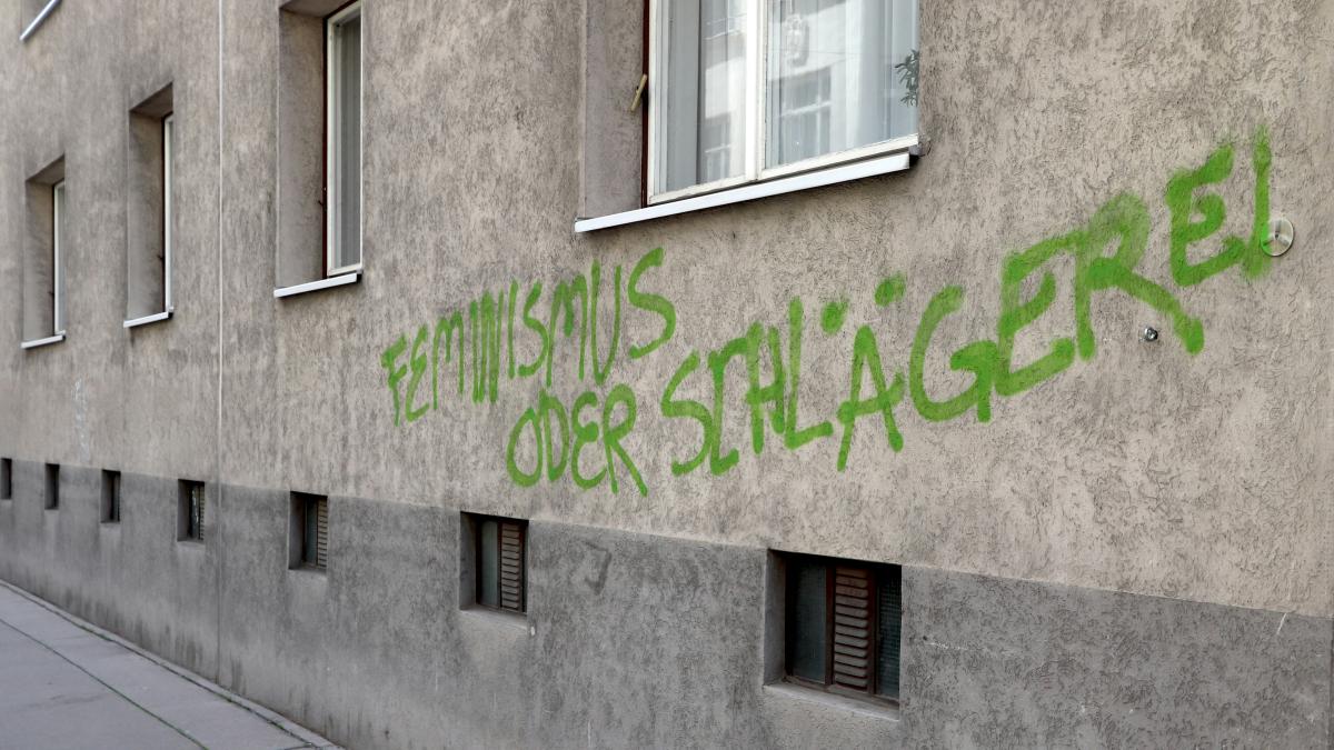 a building with graffiti on the side of it