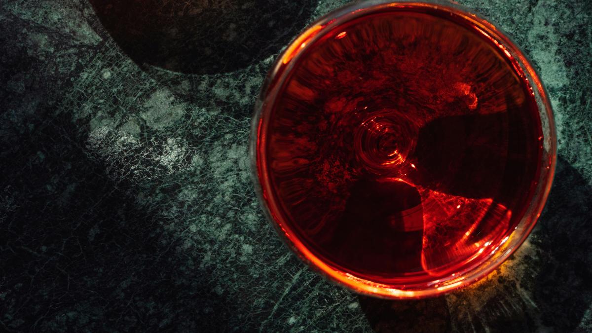 A couple of oranges sitting on top of a table