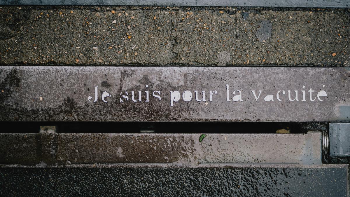 A bench that has writing on it