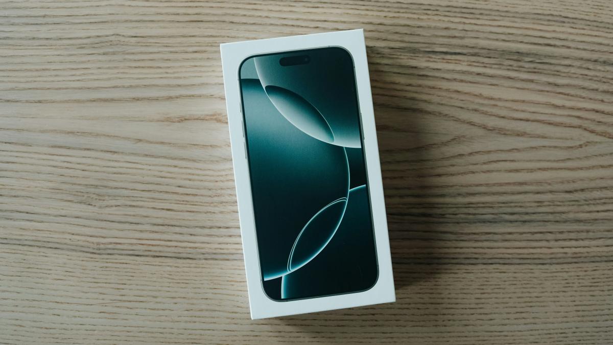 A white box sitting on top of a wooden table