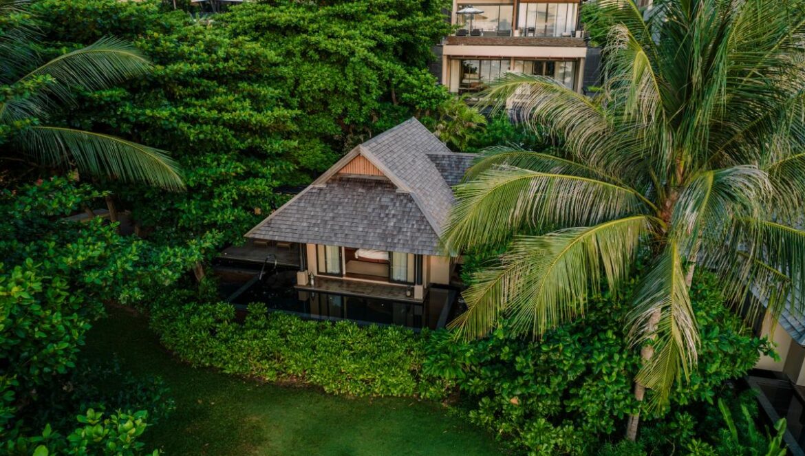 An aerial view of a resort surrounded by trees