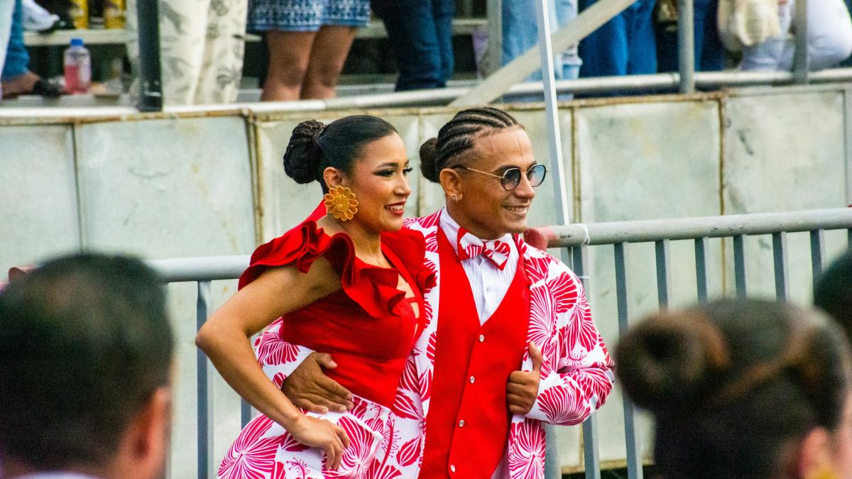 A couple of people standing next to each other