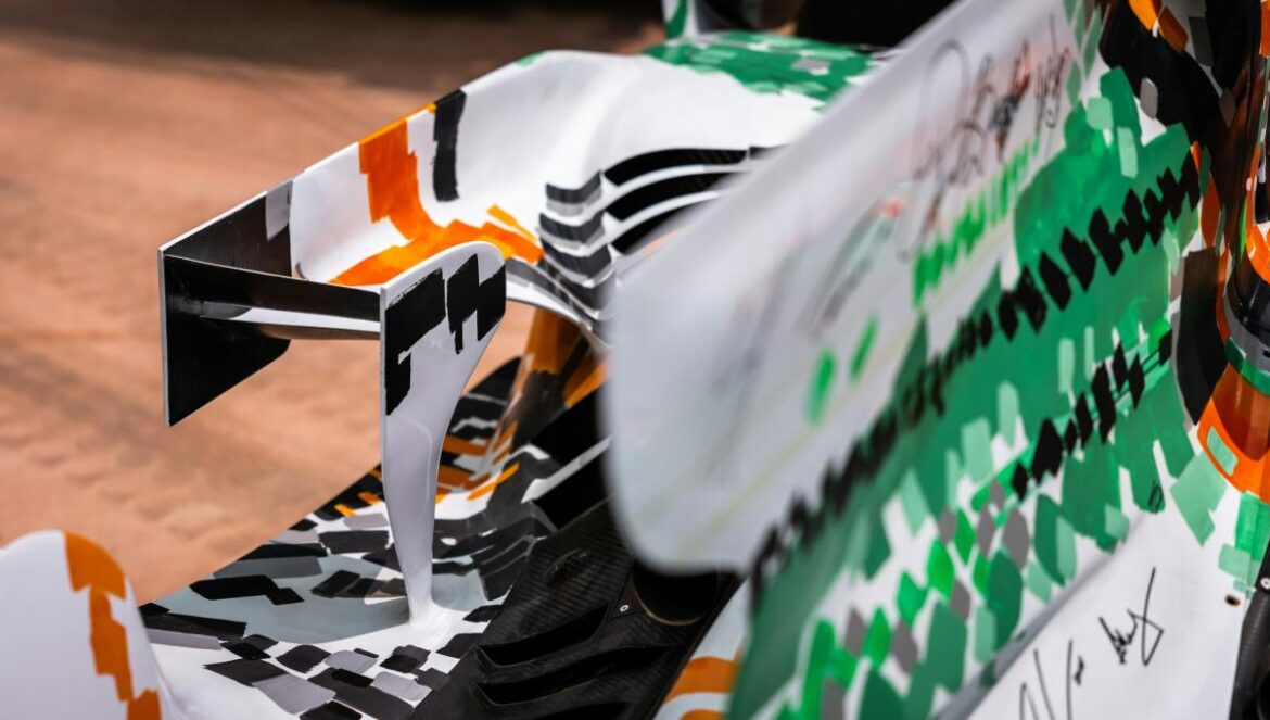 A close up of a racing car on a track