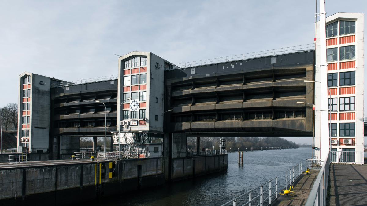 A canal lock with a modern architectural design.
