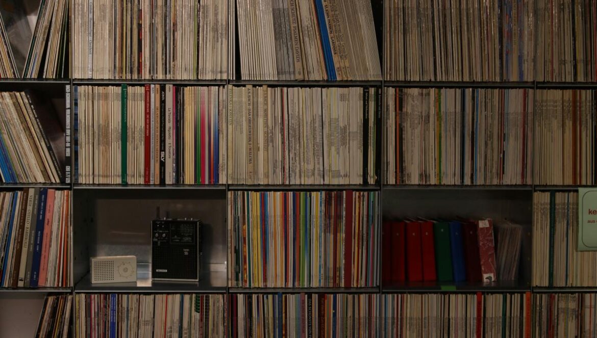 a book shelf filled with lots of books