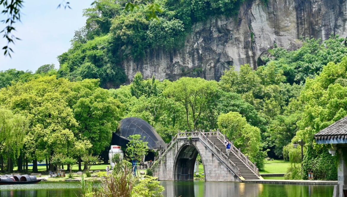 A lake with a bridge in the middle of it