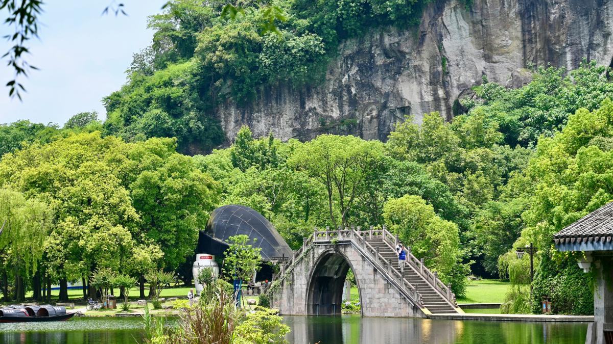 A lake with a bridge in the middle of it