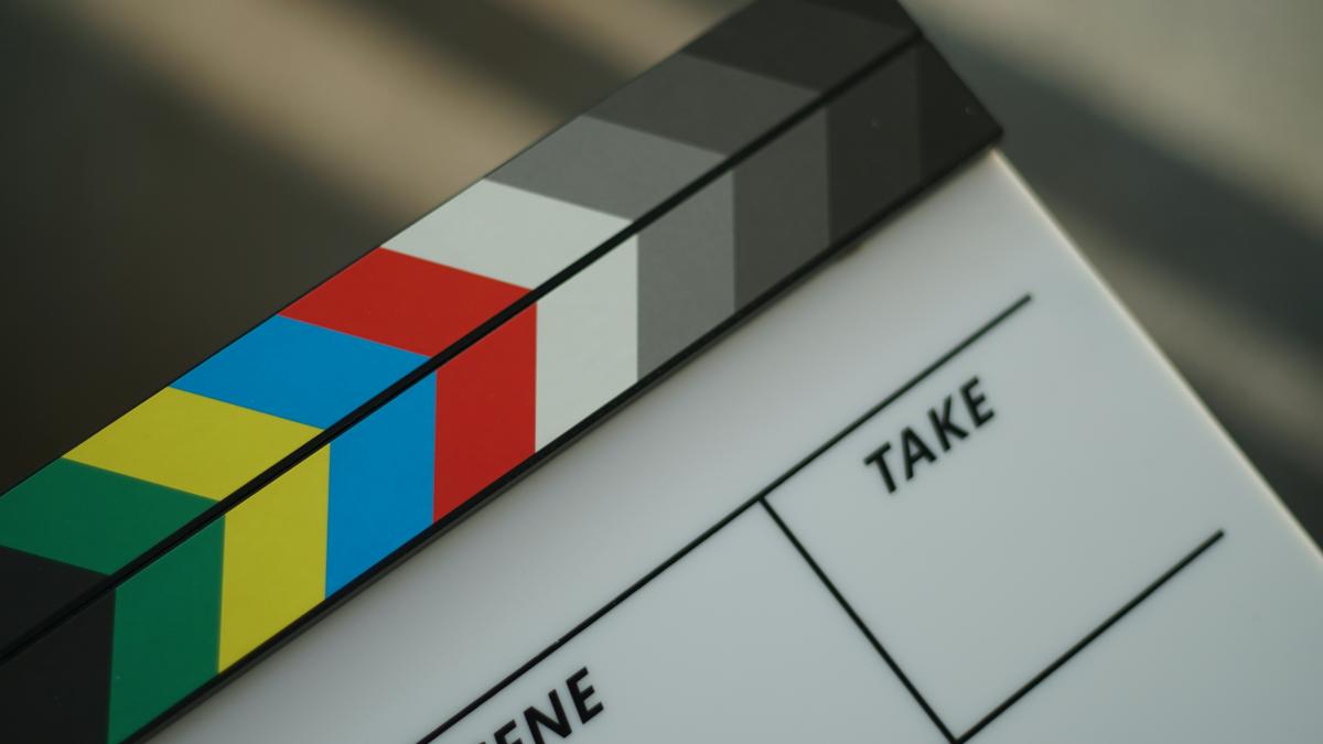 A close up of a movie clapper