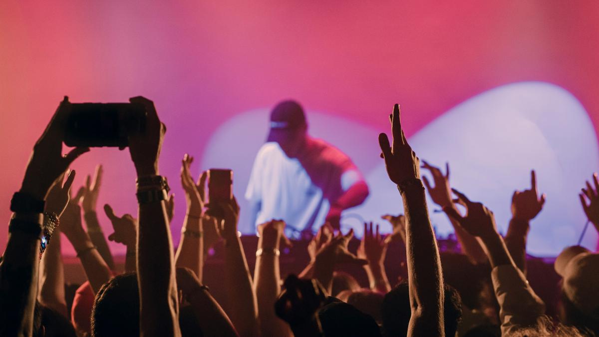 people raising their hands up