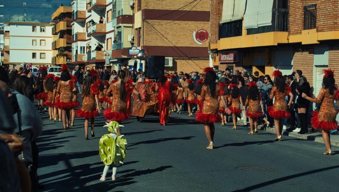 a large group of people walking down a street