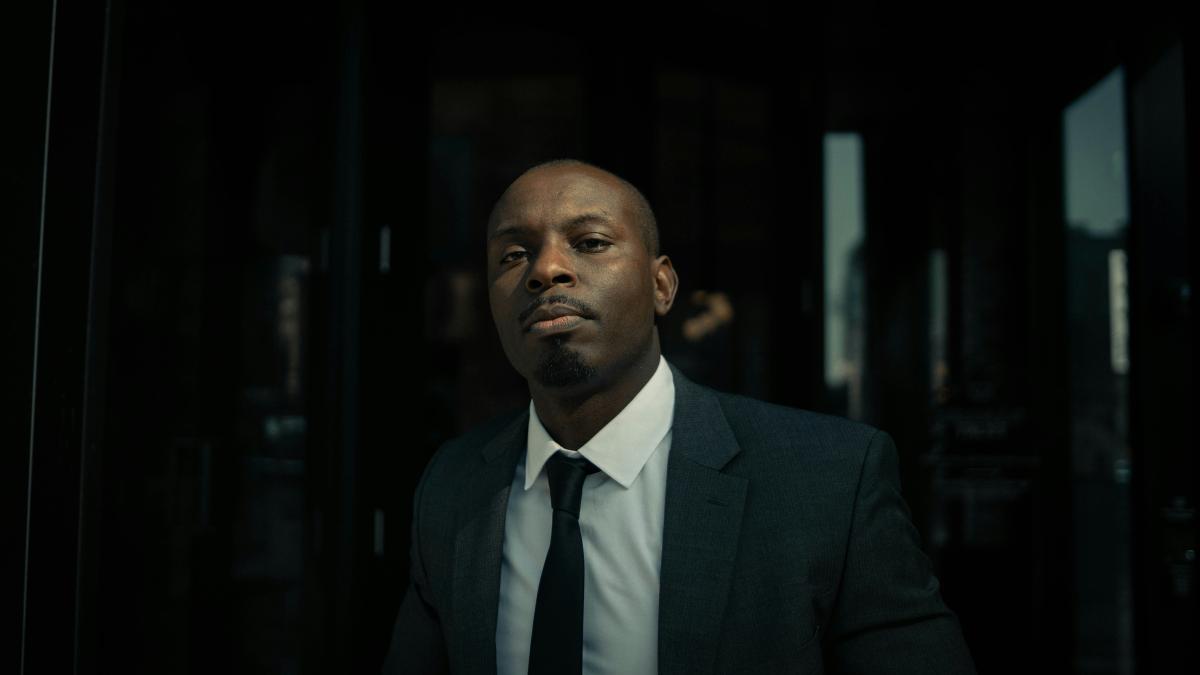 man in black suit jacket