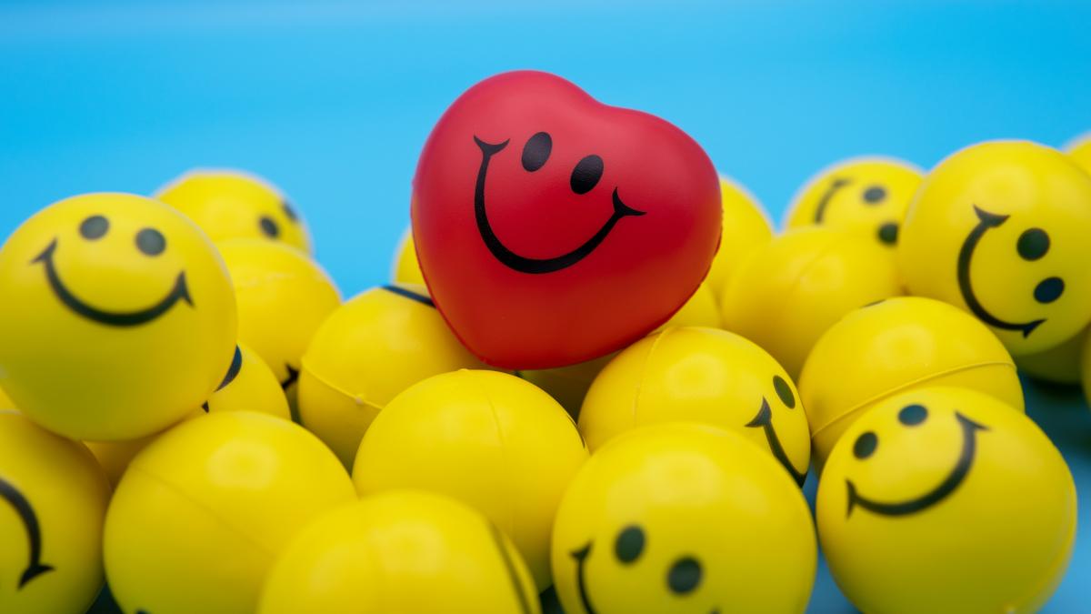 red and yellow smiley balloon