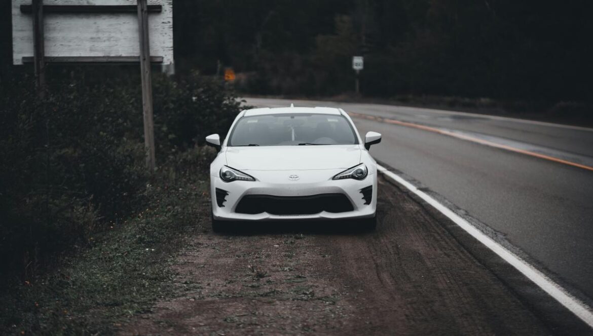 white car on road during daytime