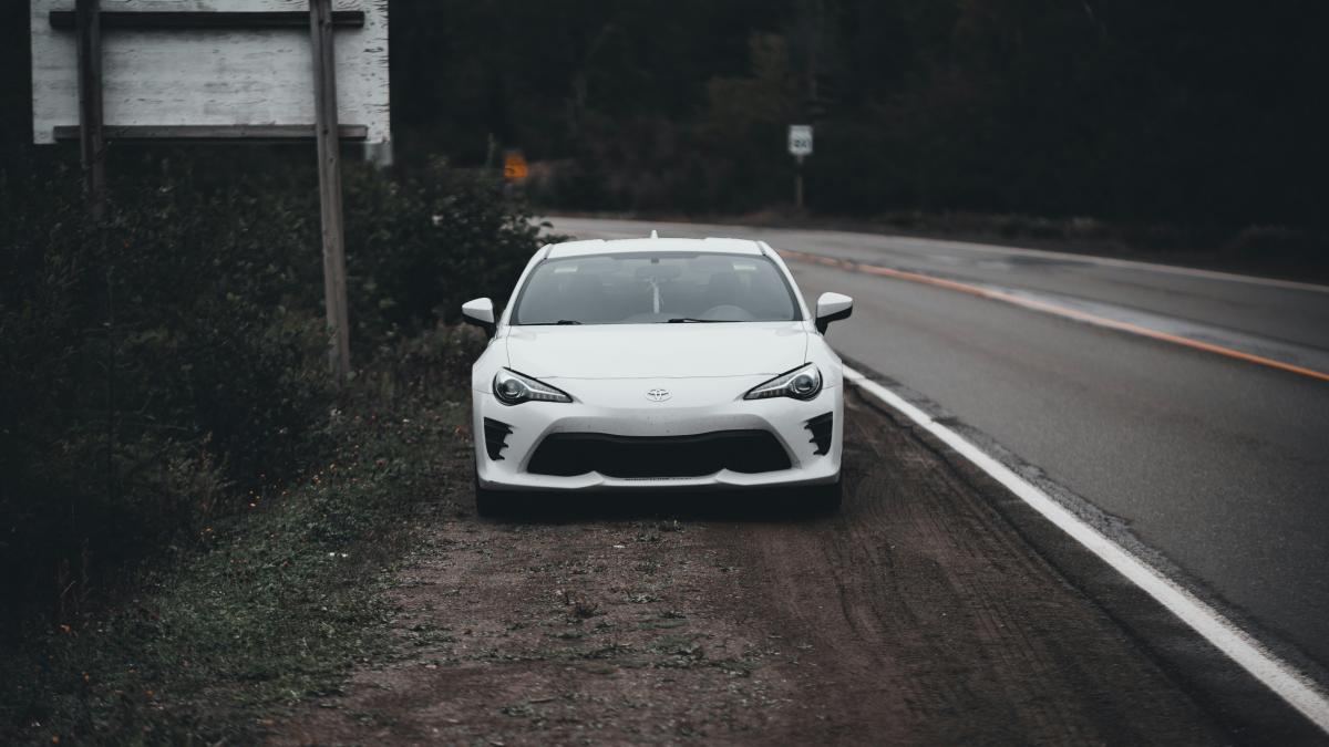white car on road during daytime