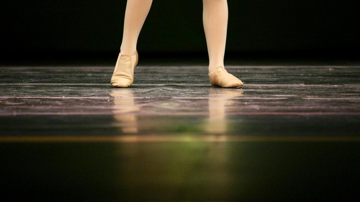 woman standing wearing valley shoes