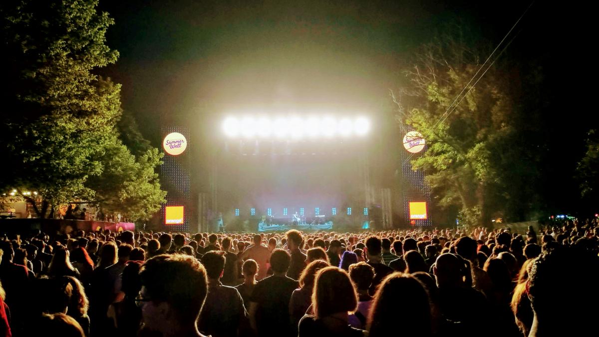 people watching concert during night time