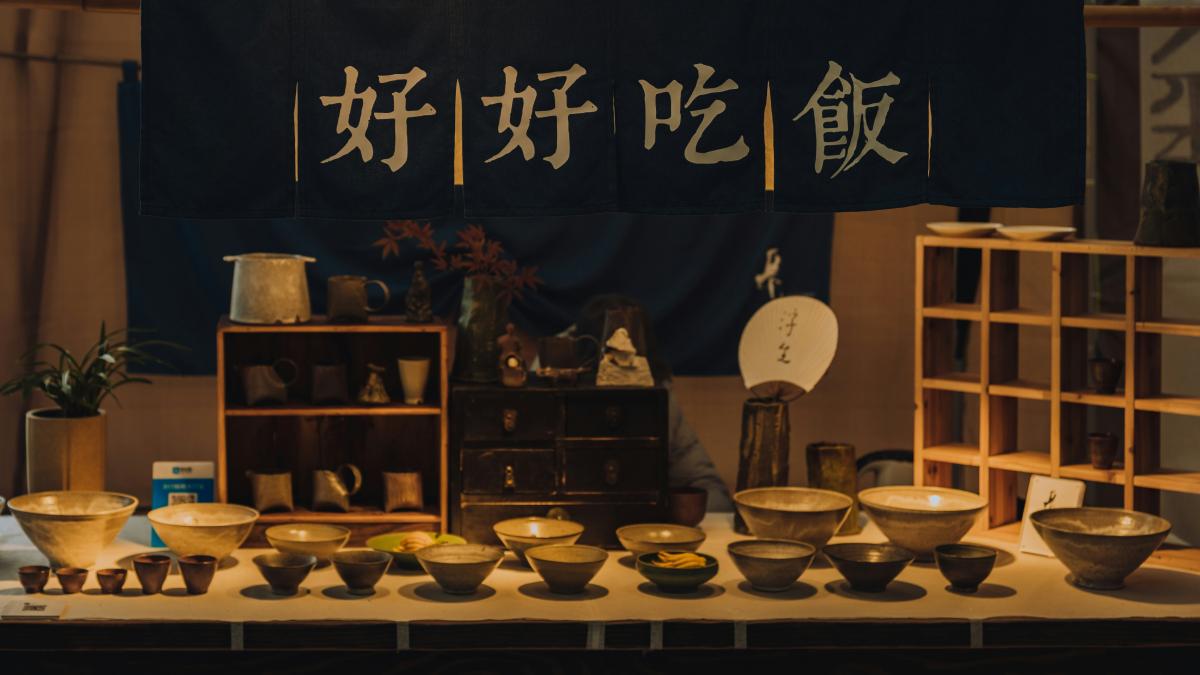 brown wooden shelf with white ceramic bowl and saucer