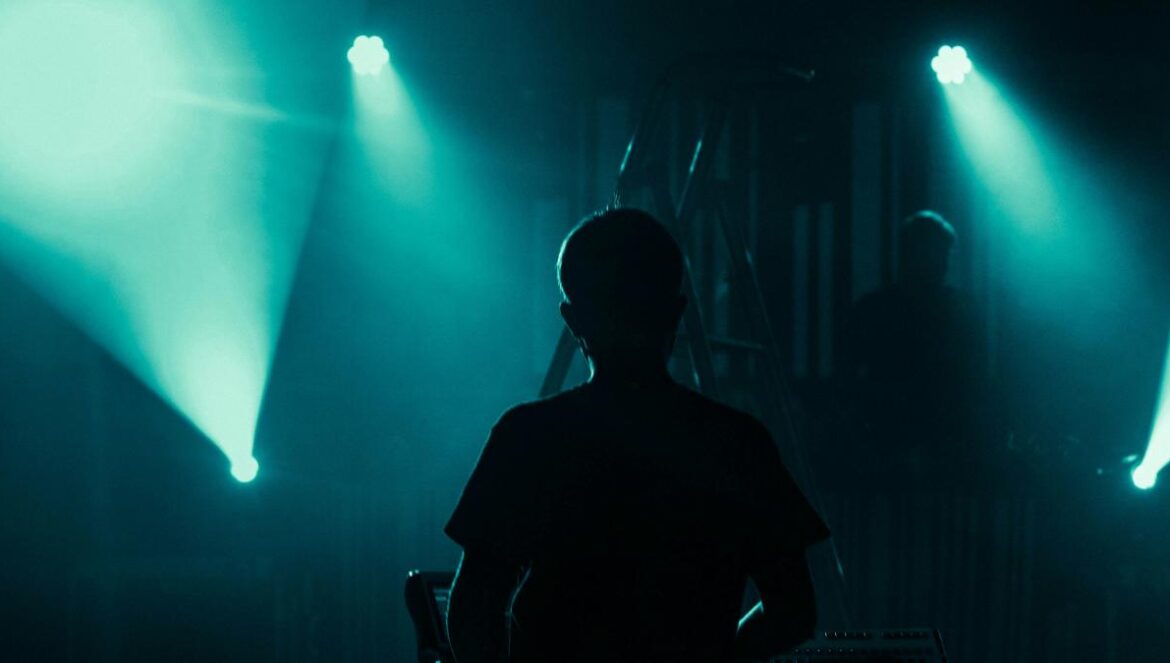 silhouette of man sitting on chair