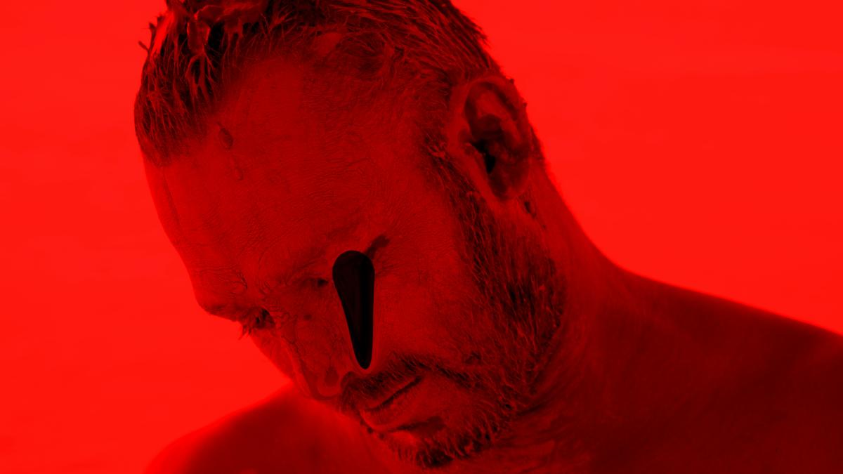 man with black hair and mustache