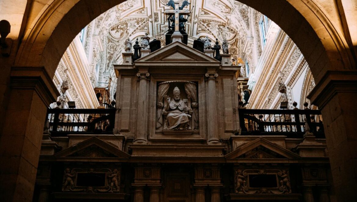 a statue of a person in a church