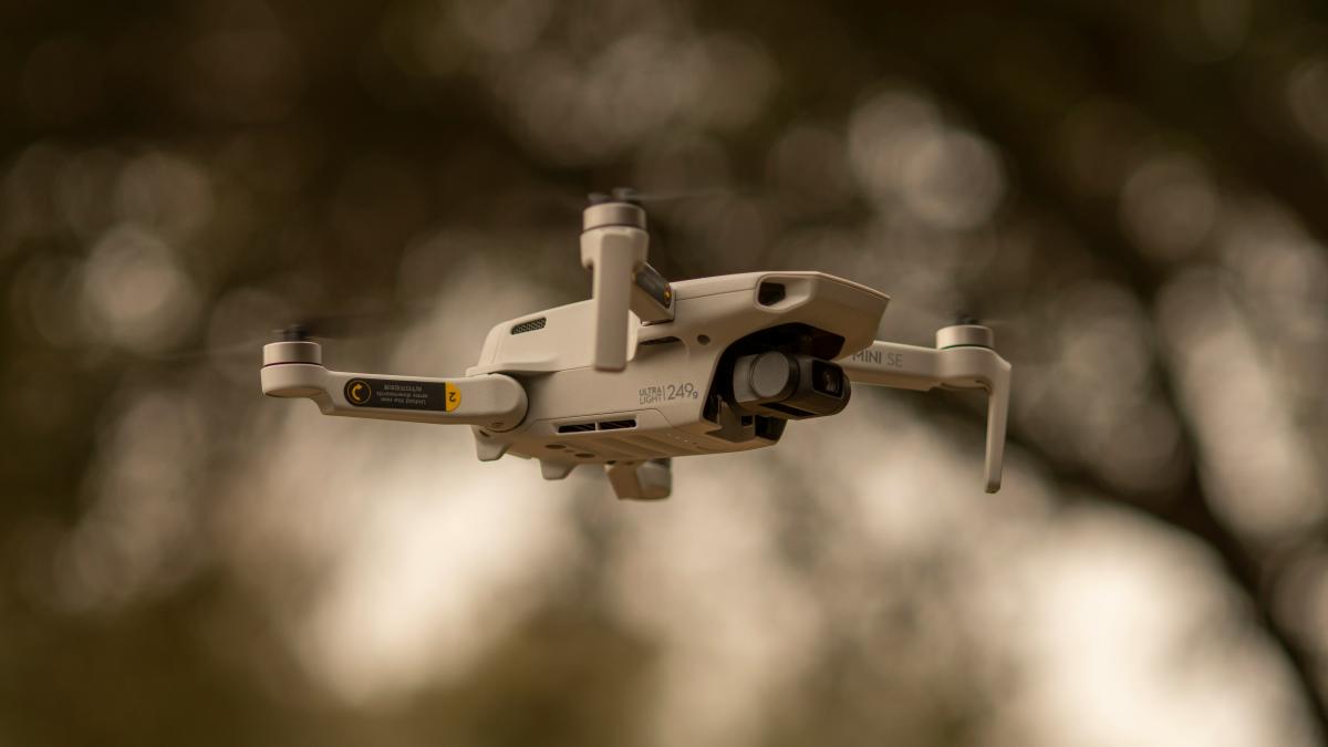 a camera attached to a small white object