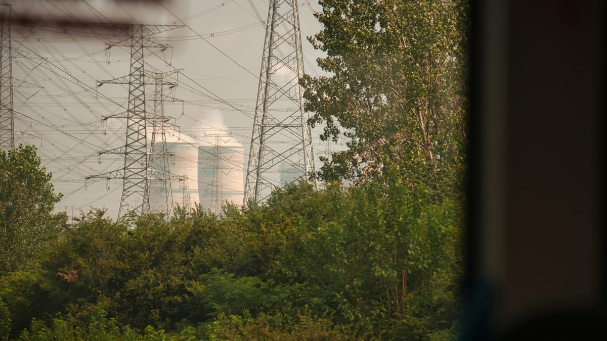 a view of a power plant through a window