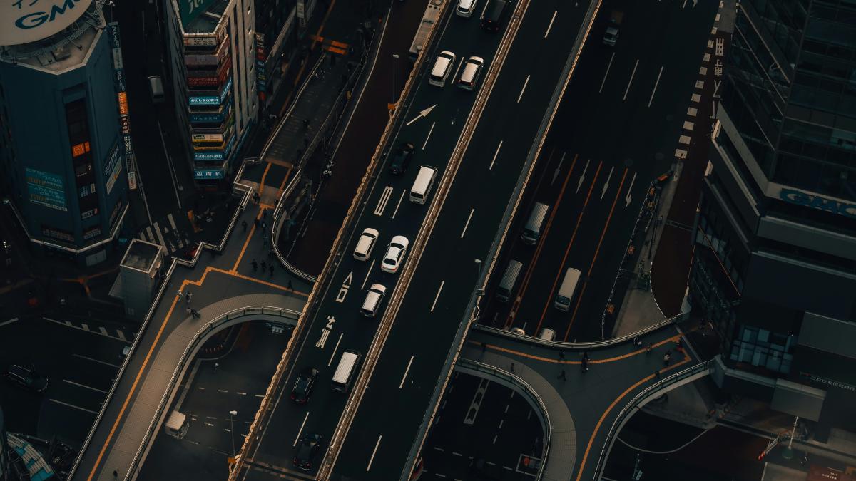 an aerial view of a busy city street at night