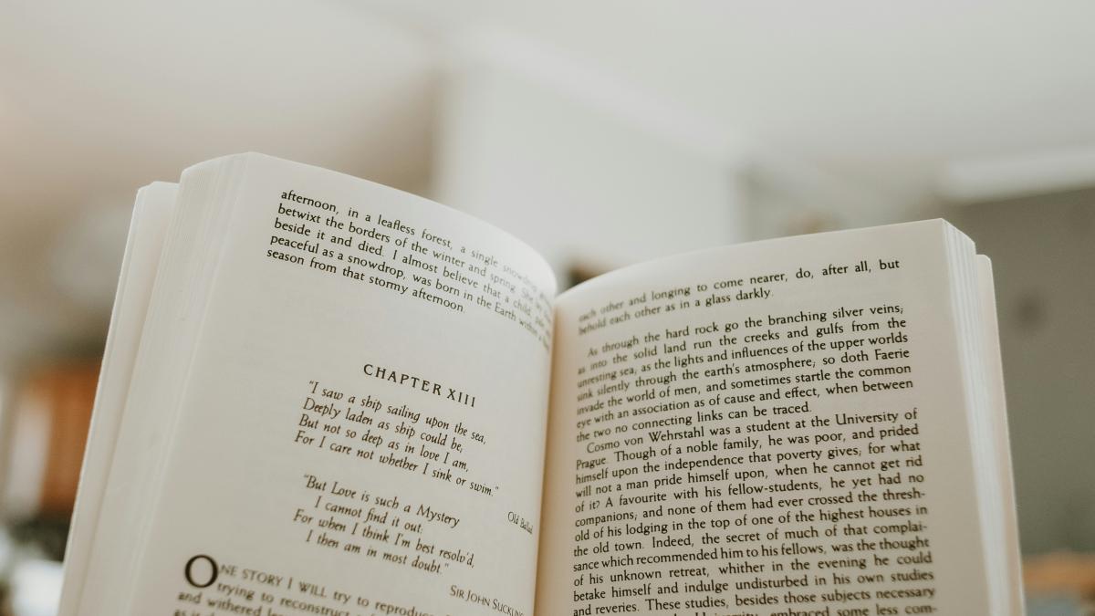 an open book sitting on top of a table