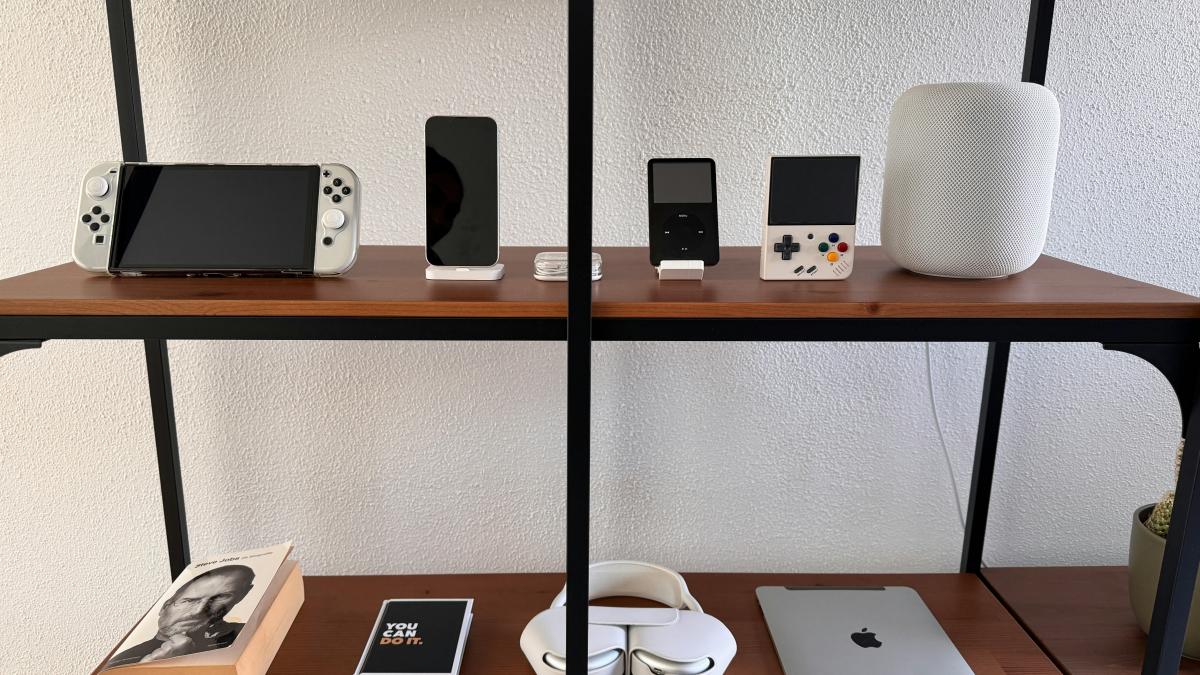 a shelf with a bunch of electronic devices on it