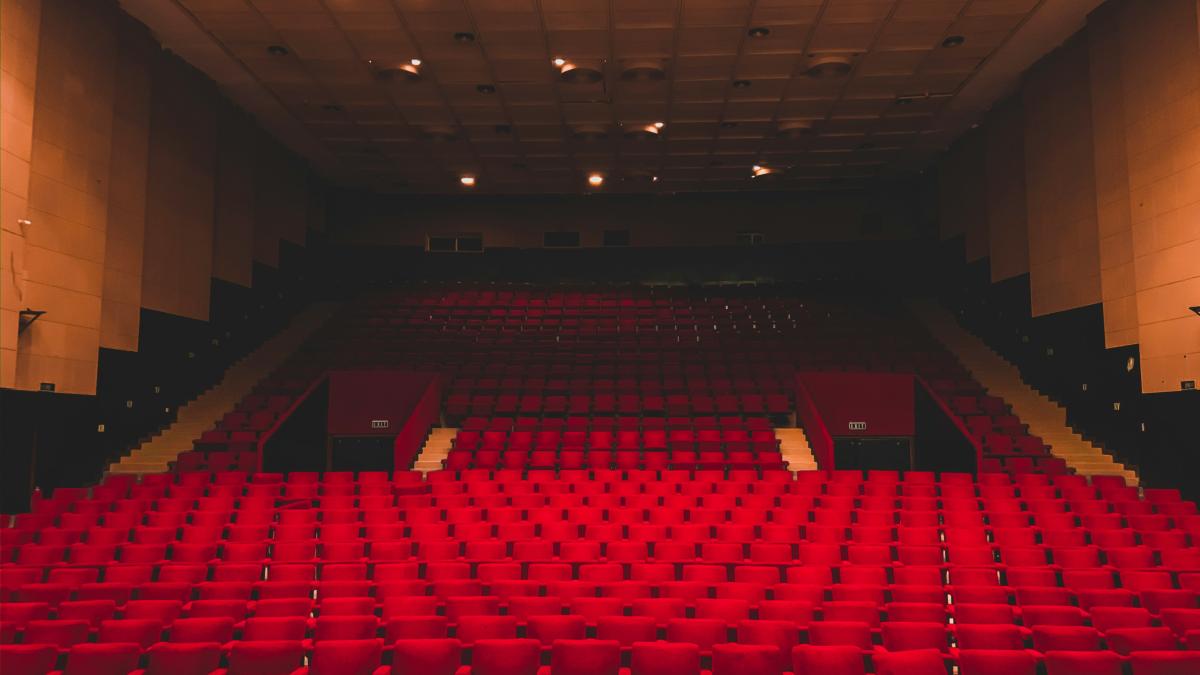 landscape photography of red seats inside a theater