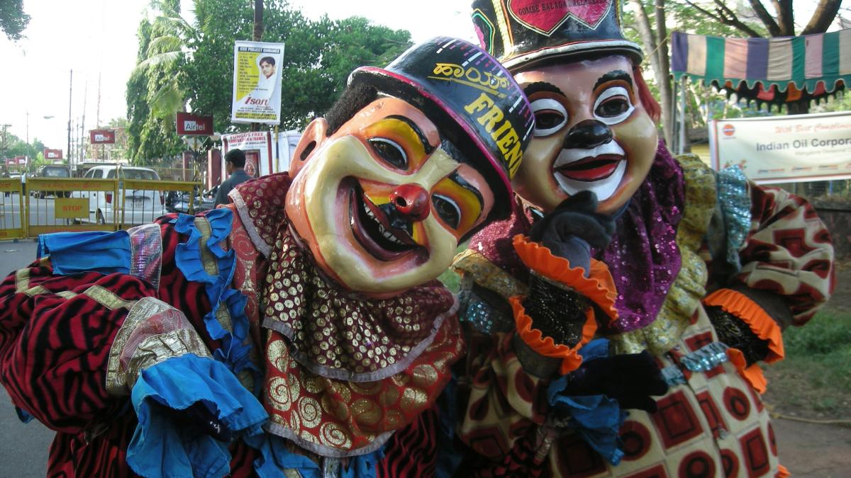 a couple of people that are standing in the street